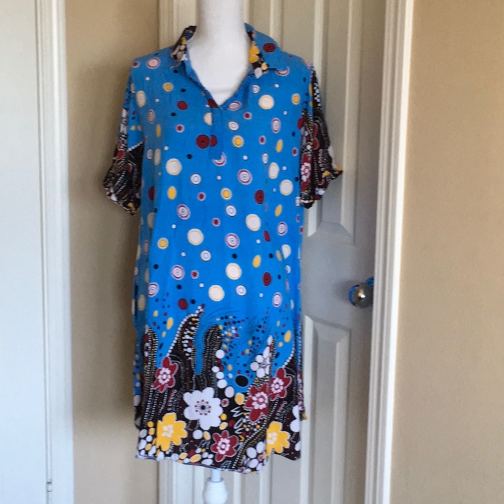 Blue polo dress fits small to large. Up to size 12/14